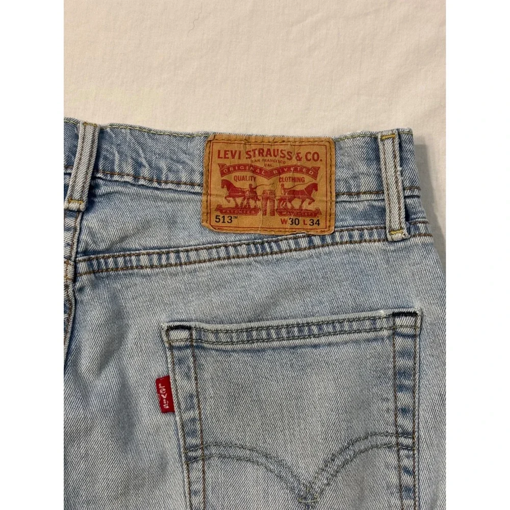 Levis 513 Slim Straight Light Wash Frayed Hem Jeans 30x34 Mens Blue